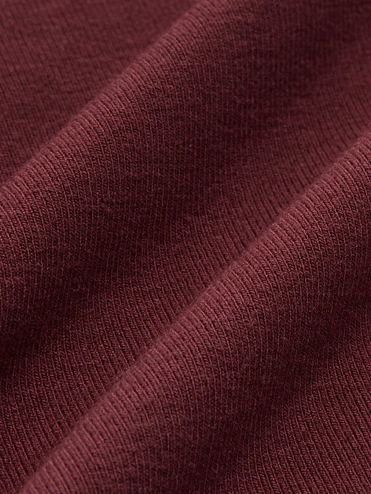 CELESTE | BLUSA PLISADA CON CUELLO CRUZADO