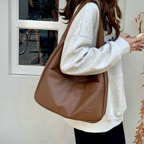 LIRA | BOLSO VERSÁTIL DE MANO