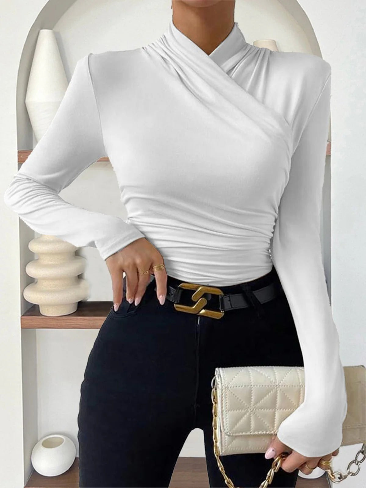 CELESTE | BLUSA PLISADA CON CUELLO CRUZADO
