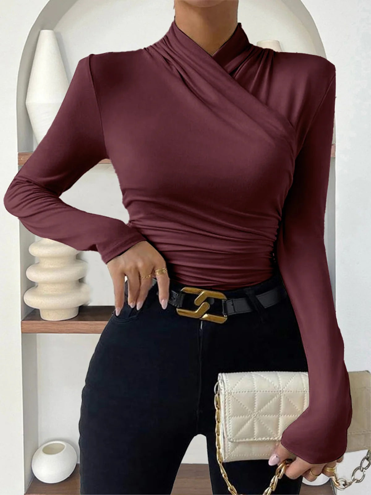 CELESTE | BLUSA PLISADA CON CUELLO CRUZADO