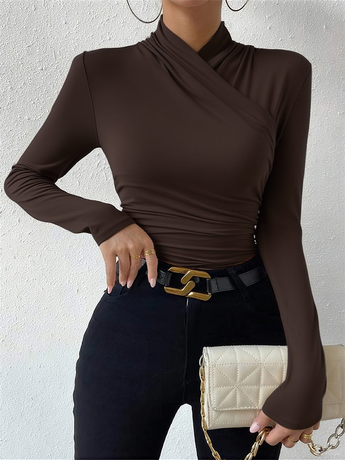 CELESTE | BLUSA PLISADA CON CUELLO CRUZADO