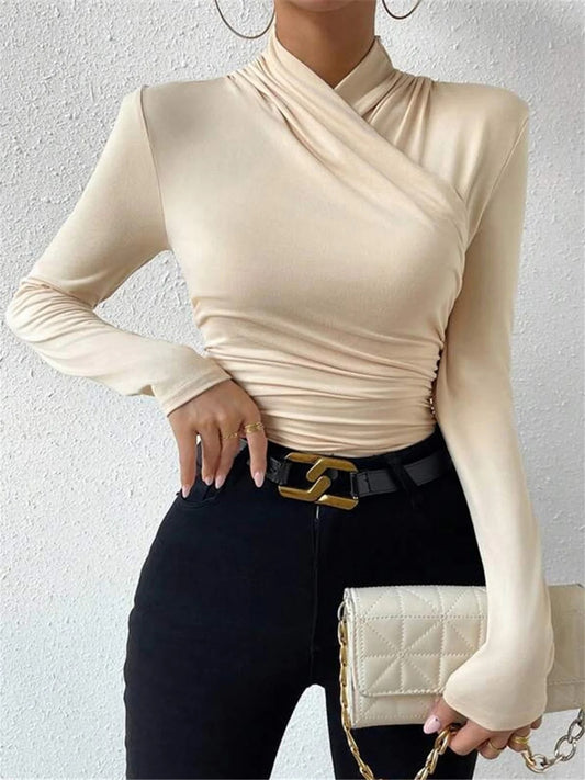 CELESTE | BLUSA PLISADA CON CUELLO CRUZADO
