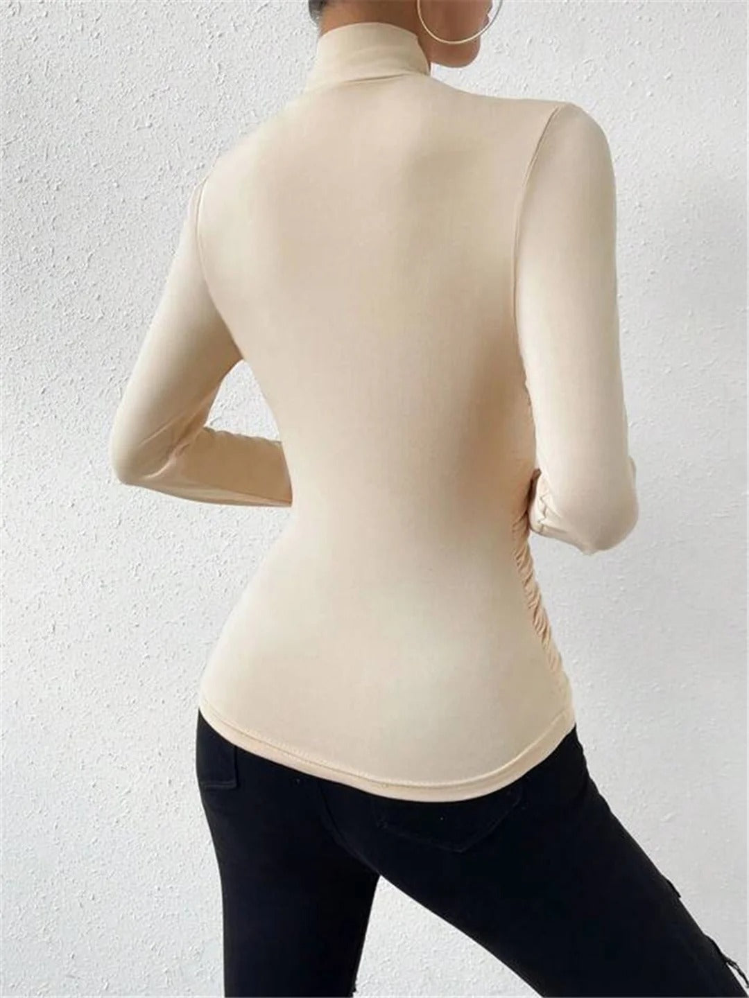 CELESTE | BLUSA PLISADA CON CUELLO CRUZADO
